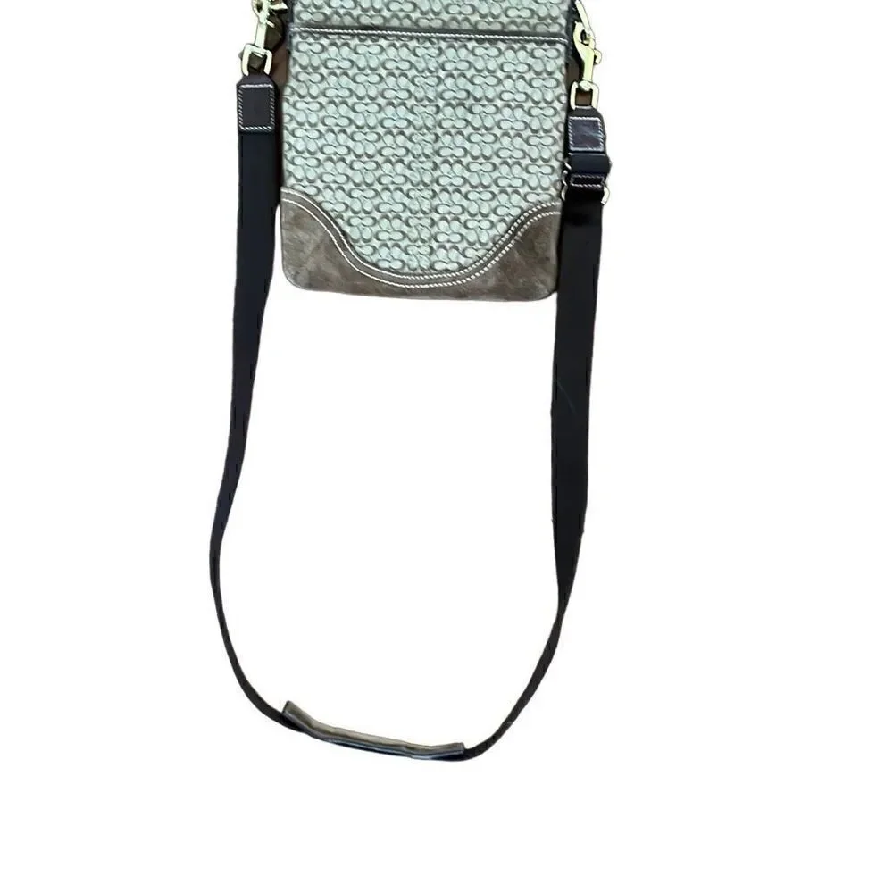 ￼ Coach, Crossbody mini bag with suede bottom
